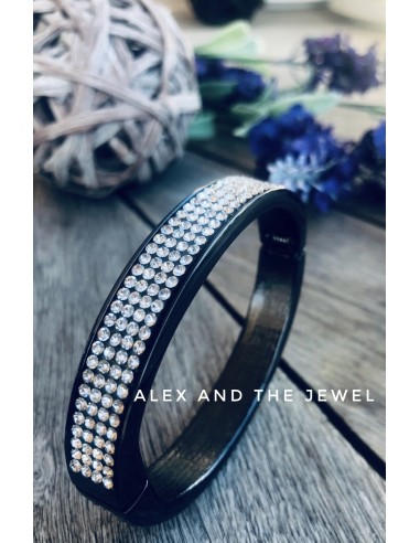 Βραχιόλι χειροπέδα από ατσάλι σε μαύρο χρώμα με καρφωτά ζιργκόν σε λευκό Milva