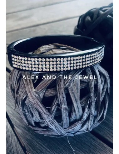 Βραχιόλι χειροπέδα από ατσάλι σε μαύρο χρώμα με καρφωτά ζιργκόν σε λευκό Milva