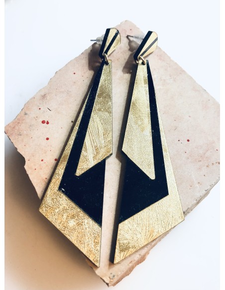 Κόσμημα σκουλαρίκια σε γεωμετρικές rock γραμμές με χρυσές και μαύρες λεπτομέρειες Rock Κόσμημα σκουλαρίκια σε γεωμετρικές rock γραμμές με χρυσές και μαύρες λεπτομέρειες Rock