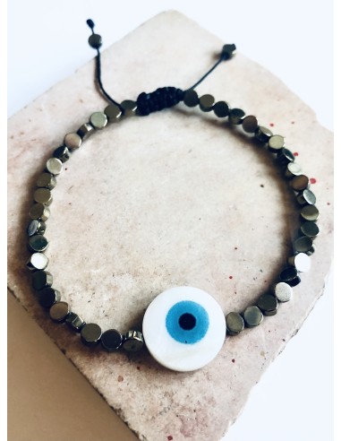 Χειροποίητο βραχιόλι σε μαύρο ή χρυσό με πέτρες αιματίτη και στοιχείο μάτι από φίλντισι σε λευκό και γαλάζιο  Mata Χειροποίητο βραχιόλι σε μαύρο ή χρυσό με πέτρες αιματίτη και στοιχείο μάτι από φίλντισι σε λευκό και γαλάζιο  Mata