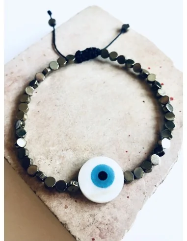 Χειροποίητο βραχιόλι σε μαύρο ή χρυσό με πέτρες αιματίτη και στοιχείο μάτι από φίλντισι σε λευκό και γαλάζιο Mata