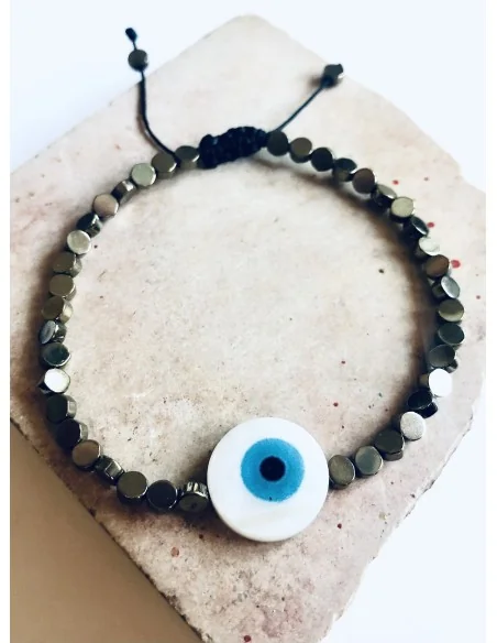 Χειροποίητο βραχιόλι σε μαύρο ή χρυσό με πέτρες αιματίτη και στοιχείο μάτι από φίλντισι σε λευκό και γαλάζιο Mata