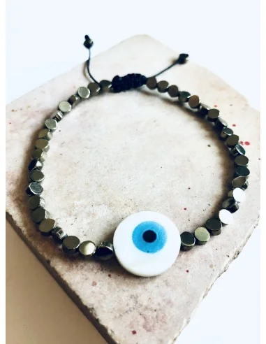 Χειροποίητο βραχιόλι σε μαύρο ή χρυσό με πέτρες αιματίτη και στοιχείο μάτι από φίλντισι σε λευκό και γαλάζιο Mata