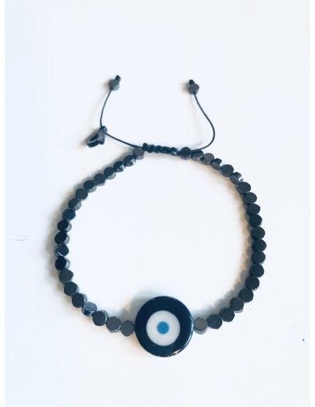 Χειροποίητο βραχιόλι σε μαύρο ή χρυσό με πέτρες αιματίτη και στοιχείο μάτι από φίλντισι σε λευκό και γαλάζιο  Mata Χειροποίητο βραχιόλι σε μαύρο ή χρυσό με πέτρες αιματίτη και στοιχείο μάτι από φίλντισι σε λευκό και γαλάζιο  Mata