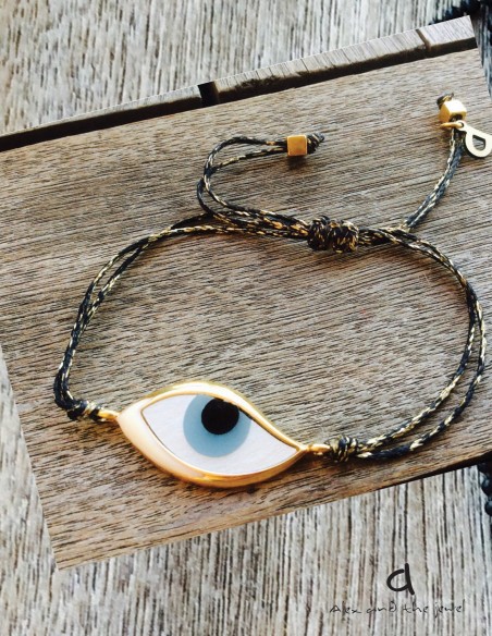 Χειροποίητο βραχιόλι κυματιστό μάτι από ορείχαλκο και φίλντισι σε δίχρωμο νήμα και διακοσμητικά επίχρυσα κυβάκια Eyes